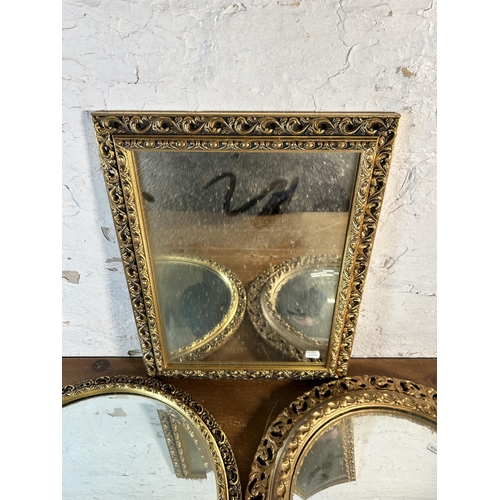 257 - Three gilt framed mirrors