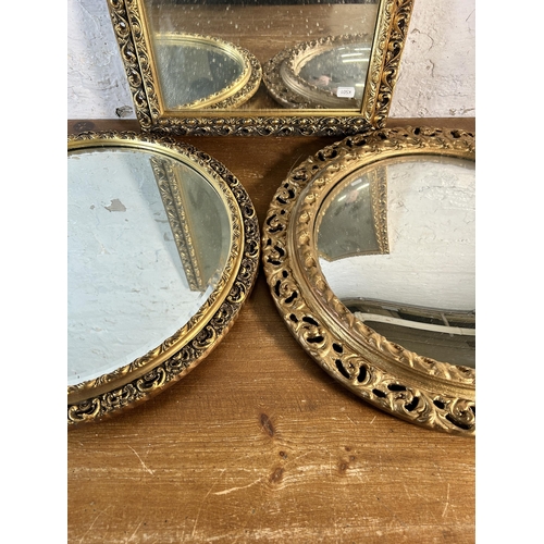 257 - Three gilt framed mirrors