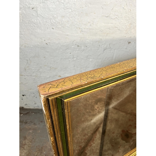 35 - A large contemporary gold and green painted rectangular bevelled edge wall mirror - approx. 135cm wi... 