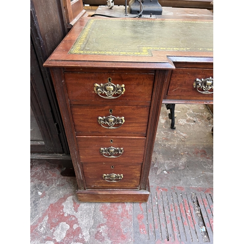 75 - A 19th century mahogany and green leather pedestal desk - approx. 73cm high x 120cm wide x 54cm deep