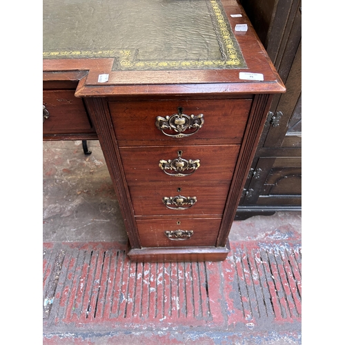 75 - A 19th century mahogany and green leather pedestal desk - approx. 73cm high x 120cm wide x 54cm deep