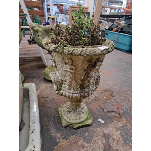 1093 - A cast stone garden planter in the form of an urn