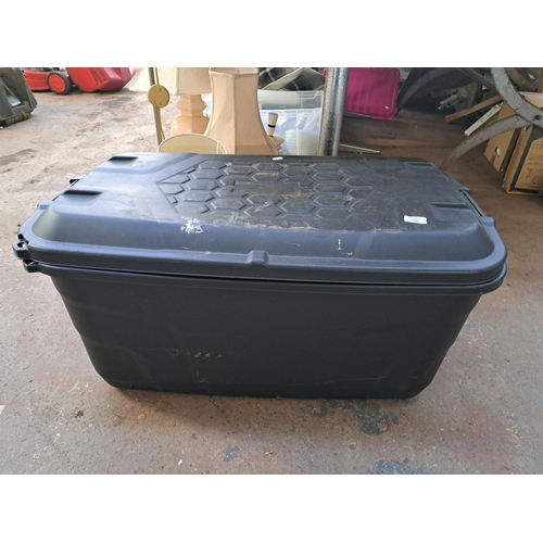 1113 - A large plastic storage box containing a large collection of assorted tools