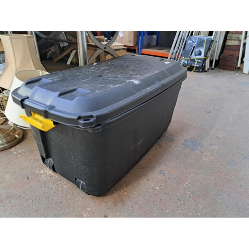 1113 - A large plastic storage box containing a large collection of assorted tools