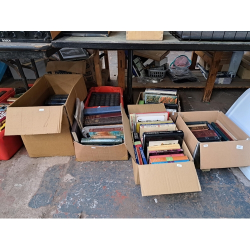 1115 - Twelve boxes containing a large collection of books to include Auction and Antique related, vintage ... 