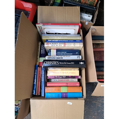 1115 - Twelve boxes containing a large collection of books to include Auction and Antique related, vintage ... 