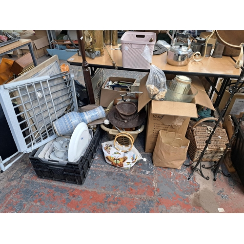 1119 - A large collection of house clearance items to include table lamps, football jerseys, vintage glass ... 