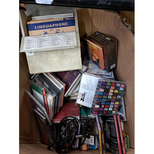 1123 - Three boxes containing CDs, Sony CD radio cassette recorder, books etc.