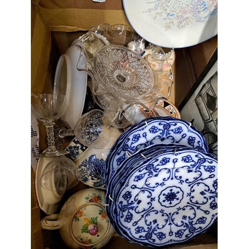 1124 - A box containing Victorian Majolica leaf dish, blue and white pattern dishes, oil on board of a Lake... 