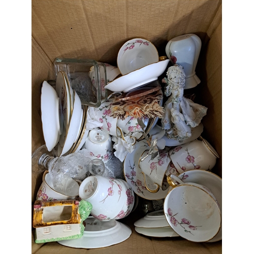 1131 - A box containing cast metal urn planter, Adderley Chinese Blossom tea set, cottageware etc.