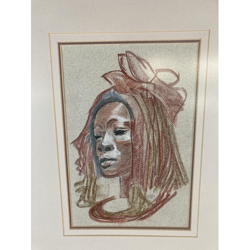 234 - A framed African pastel portrait signed lower right - approx. 58cm high x 47cm wide