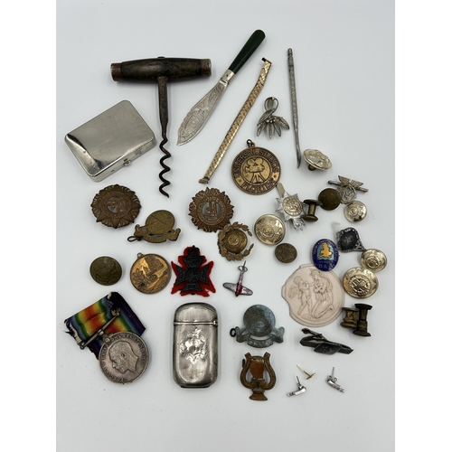 2354 - A collection of items to include WWI War medal presented to 22197 Pte. H. Woodstock R.A.M.C., white ... 