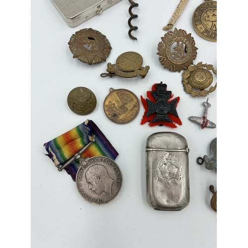 2354 - A collection of items to include WWI War medal presented to 22197 Pte. H. Woodstock R.A.M.C., white ... 