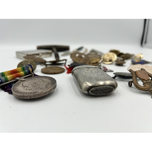 2354 - A collection of items to include WWI War medal presented to 22197 Pte. H. Woodstock R.A.M.C., white ... 