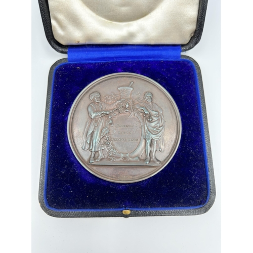 2355 - A cased 1852 Pharmaceutical Society of Great Britain bronze medal presented to Charles Gilling Mater... 