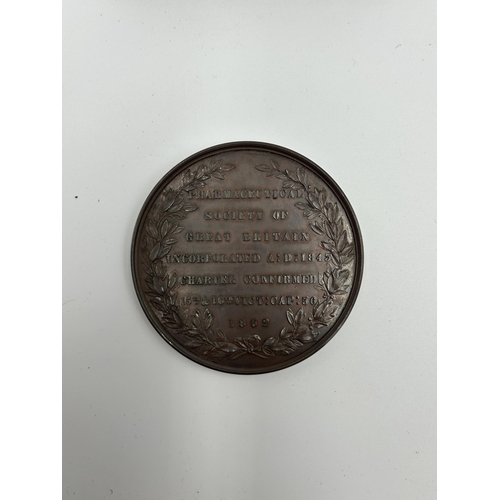 2355 - A cased 1852 Pharmaceutical Society of Great Britain bronze medal presented to Charles Gilling Mater... 