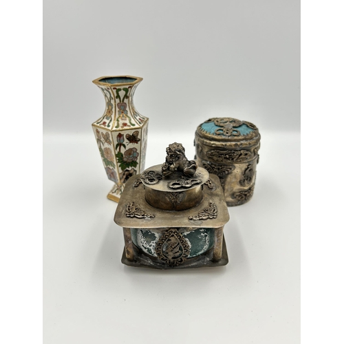 2356 - Three Oriental items, one Tibetan white metal and stone cylindrical lidded box, one Tibetan white me... 