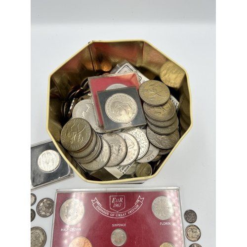 2357 - A collection of world coins with silver examples to include packaged 90% 'Kennedy' dollar, 92.5% six... 