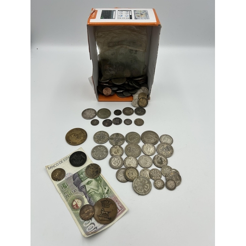 2358 - A collection of mostly British coins with silver examples to include 92.5% 1887 florin, two shilling... 