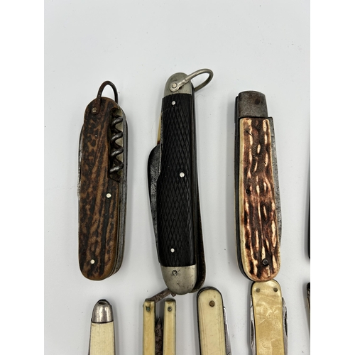 2370 - Twelve pocket knives and multi-tools