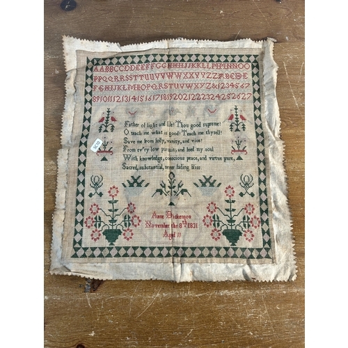 245 - A 19th century unframed sampler by Anne Dickenson, November 8th, 1831, aged 11 - approx. 46cm high x... 