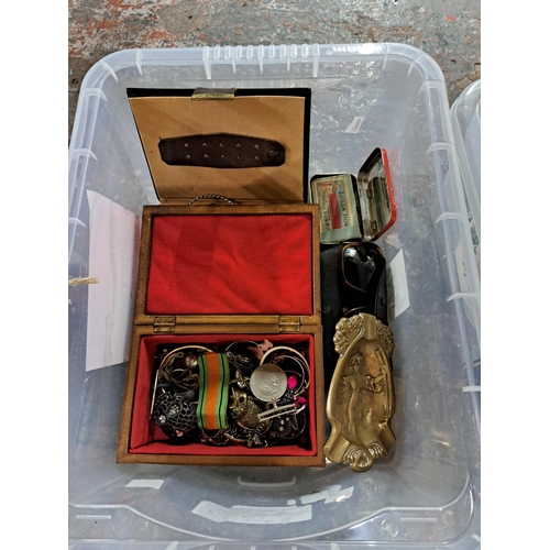 1172 - Four boxes containing costume jewellery, WWII British Defence medal with ribbon, Art Nouveau brass a... 