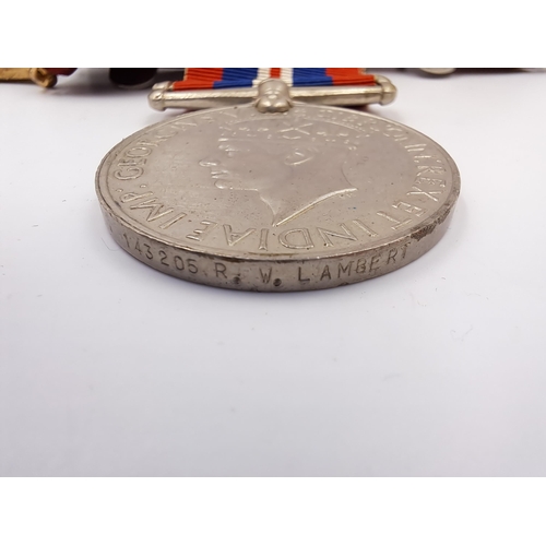 2007 - A WWI and II family medal group presented to Pte. W. R. Lambert 2nd S. A. I. and 143205 R. W. Lamber... 