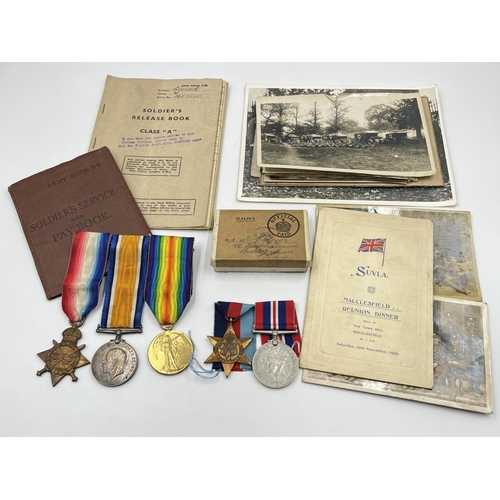 Two WWI and WWII father and son medal groups comprising a WWI medal group presented to 2603 Pte. W. Goliger Ches .R. including Victory, War and 1914-15 Star and a boxed WWII medal pair presented to W. Goliger including the 1939-1945 Star and Victory together with a collection of war ephemera to include black and white photographs, Soldier's service and Pay Book, Soldier's release book etc.