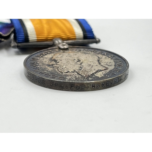 2031 - A boxed WWI British medal pair presented to 229908 Spr. F. C. H. Heard R. E.