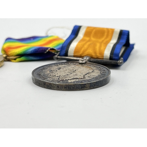 2031 - A boxed WWI British medal pair presented to 229908 Spr. F. C. H. Heard R. E.