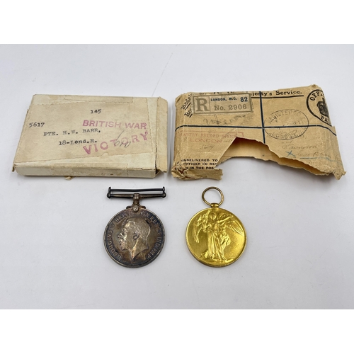 2033 - A boxed WWI British medal pair presented to 5617 Pte. H. W. Barr 18-Lond. R.