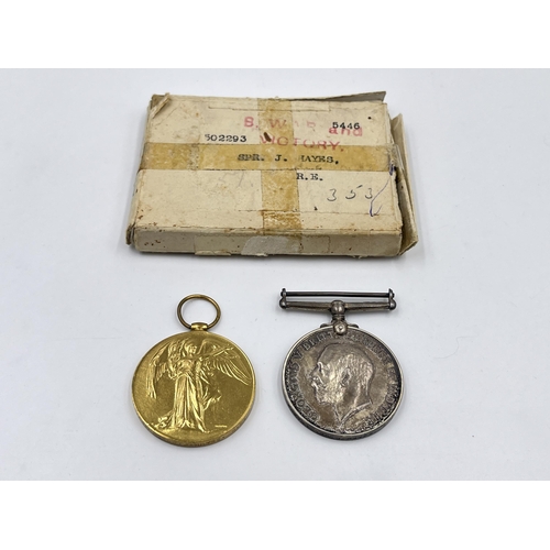 2036 - A boxed WWI British medal pair presented to 502293 Spr. J. Hayes R.E.