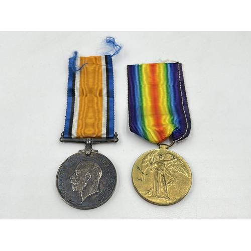 2037 - A boxed WWI British medal pair presented to 24250 Pte. H. Thorpe. R. Lanc. R.