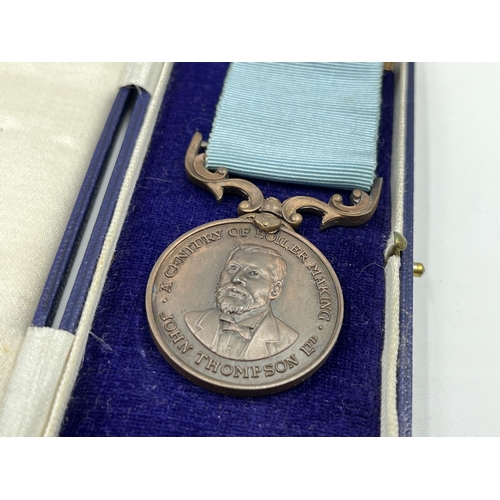 2039 - Three cased 'A Century of Boiler Making - John Thompson Ltd.' medals presented to W. Ellis, one 1892... 