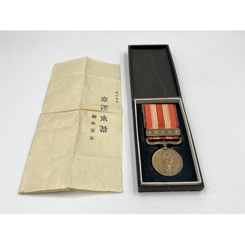 2044 - A boxed 1931-34 China Incident War medal