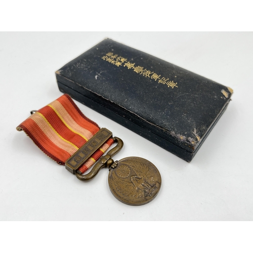 2054 - A boxed Japanese Manchurian Incident medal