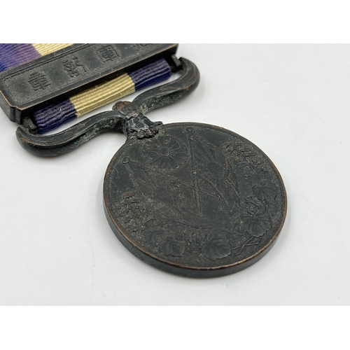 2059 - Two Japanese 1914-1920 First World War medals