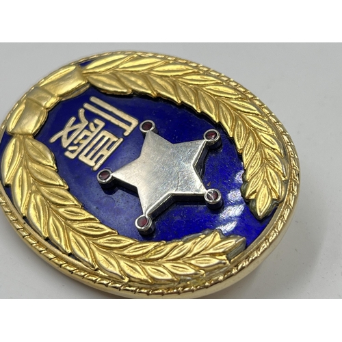 2060 - A boxed Tokyo Security Service Association badge