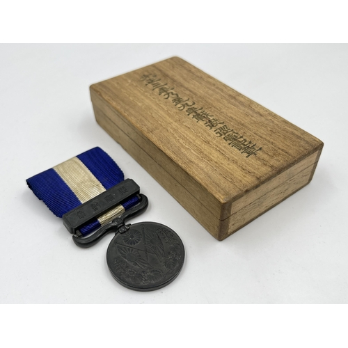 2061 - A boxed Japanese 1914-1920 First World War medal