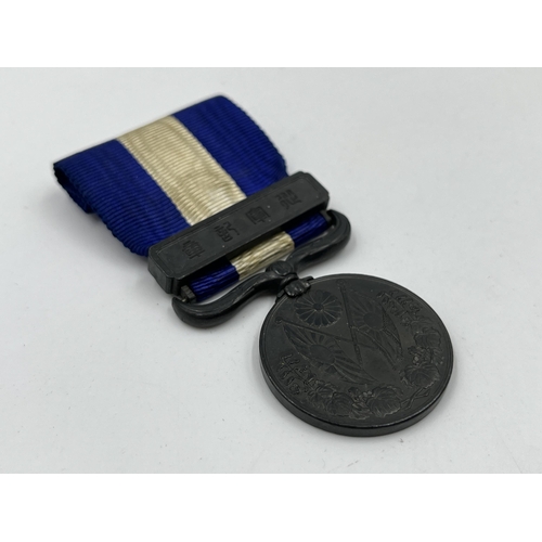 2061 - A boxed Japanese 1914-1920 First World War medal