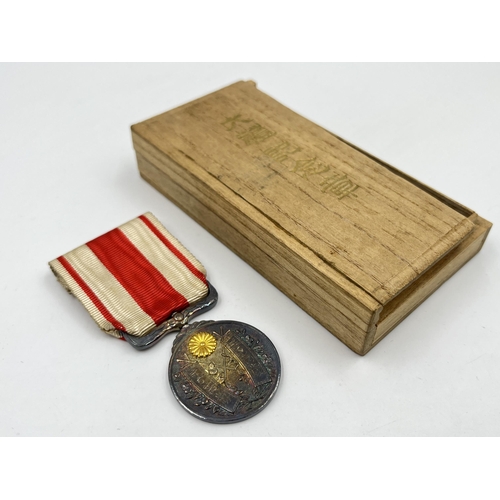 2063 - A boxed Japanese 1915 Taisho Enthronement commemorative medal