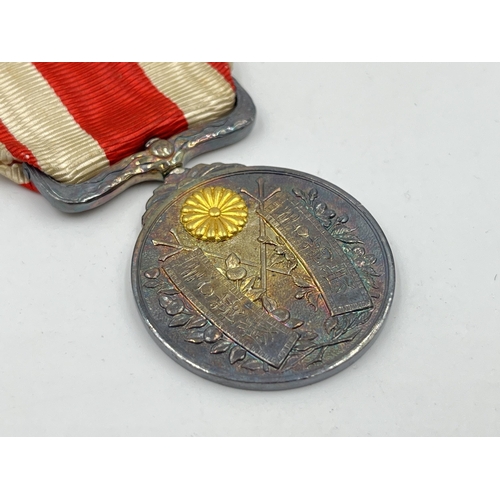 2063 - A boxed Japanese 1915 Taisho Enthronement commemorative medal