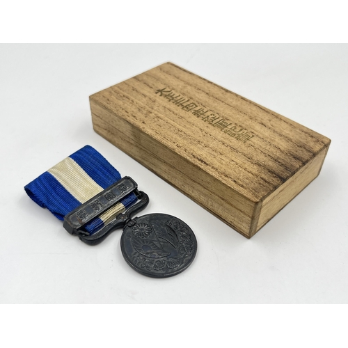 2064 - A boxed Japanese 1914-1920 First World War medal