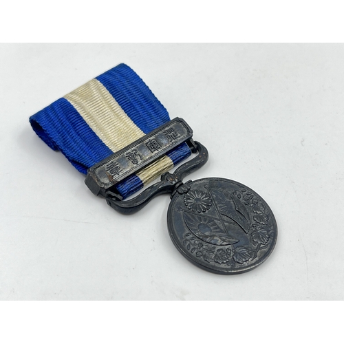 2064 - A boxed Japanese 1914-1920 First World War medal