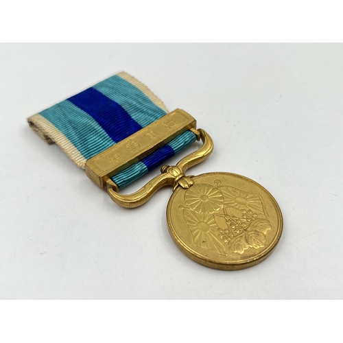 2069 - A boxed 1904-1905 Russo-Japanese War medal