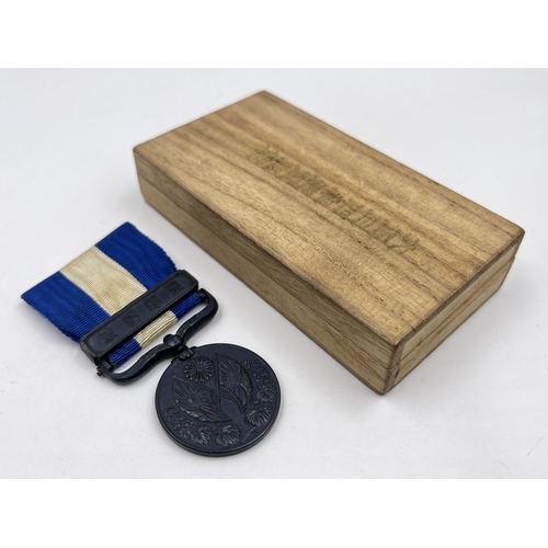 2070 - A boxed Japanese 1914-1920 First World War medal