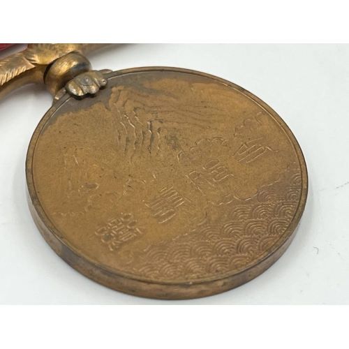 2073 - A boxed 1937-1945 China Incident War medal