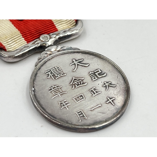 2074 - A boxed Japanese 1915 Taisho Enthronement commemorative medal