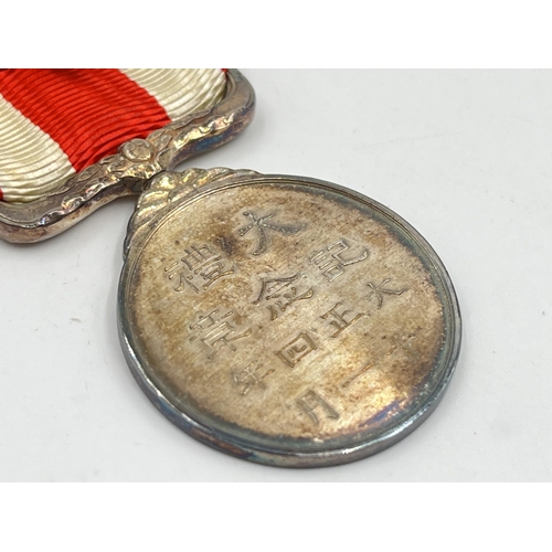 2075 - A boxed Japanese 1915 Taisho Enthronement commemorative medal