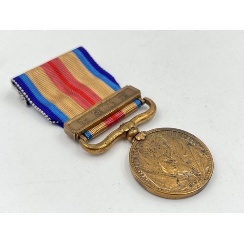 2077 - A boxed 1937-1945 China Incident War medal